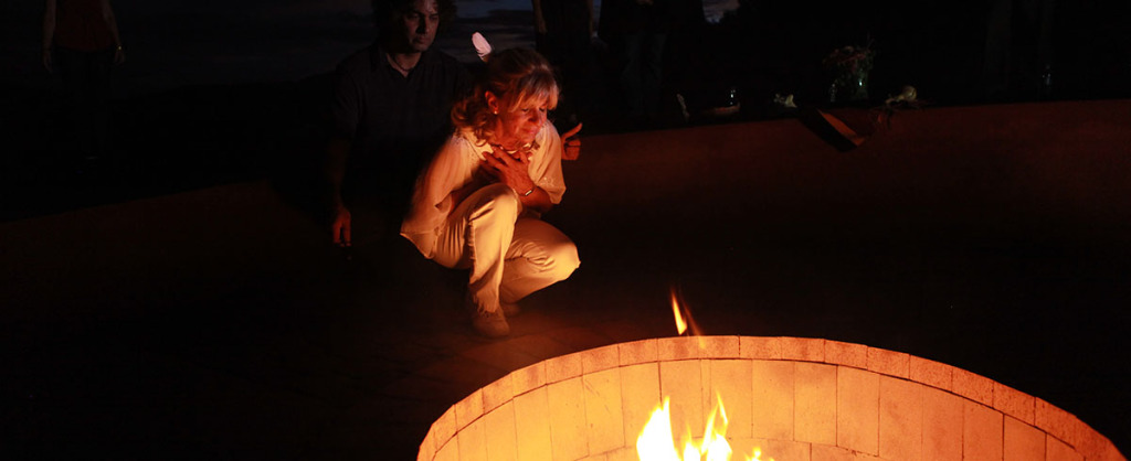 Woman healing her soul in front of fire
